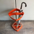 Orange umbrella stand - space age